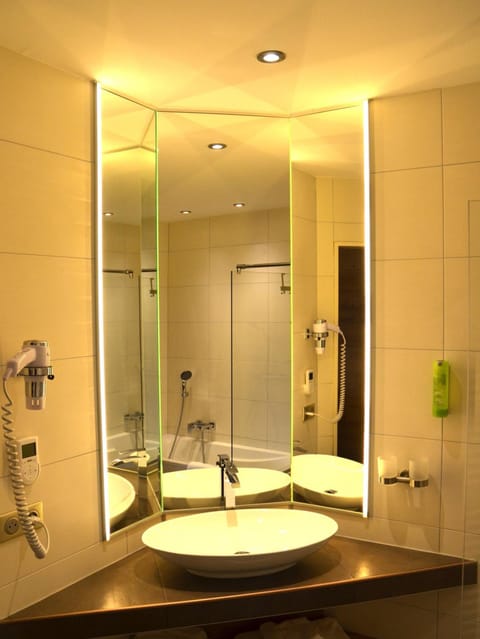 Shower, rainfall showerhead, hair dryer, towels