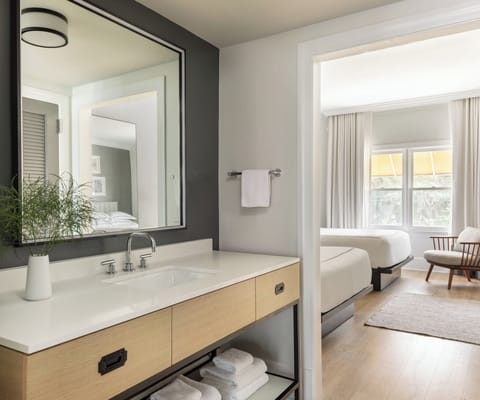 Suite, 1 Bedroom | Bathroom | Combined shower/tub, designer toiletries, hair dryer, bathrobes