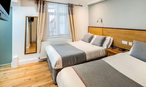 Superior Quadruple Room, 2 Double Beds | Free WiFi, bed sheets