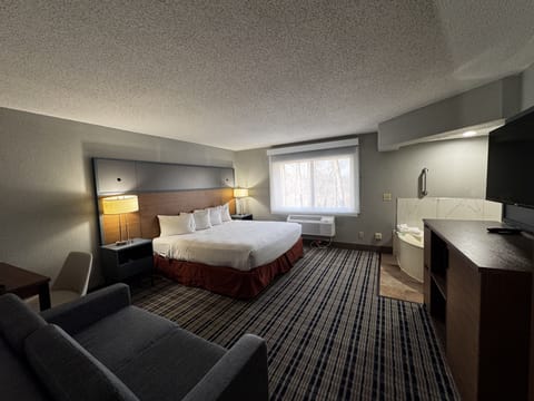 Suite, 1 King Bed, Non Smoking | Pillowtop beds, desk, laptop workspace, blackout drapes