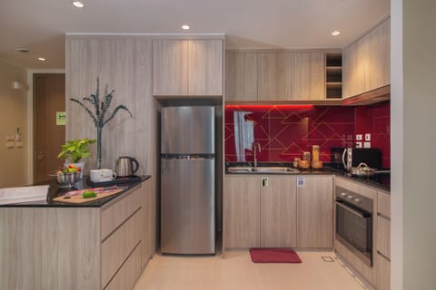 Deluxe Room, 2 Bedrooms | Private kitchen | Highchair