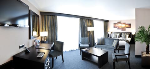 Privilege Suite with balcony | Premium bedding, desk, blackout drapes, soundproofing