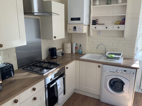 Design Apartment, 2 Bedrooms | Private kitchen | Fridge, microwave, oven, coffee/tea maker