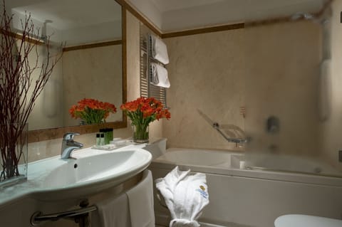 Superior Double or Twin Room | Bathroom | Combined shower/tub, deep soaking tub, eco-friendly toiletries