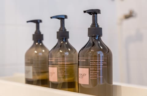 Eco-friendly toiletries, hair dryer, bathrobes, towels