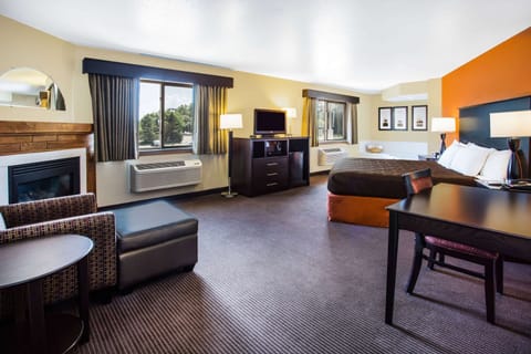 Superior Suite, 1 King Bed, Non Smoking | Desk, blackout drapes, iron/ironing board, free cribs/infant beds