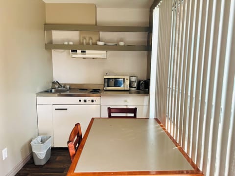 Standard Room | Private kitchen | Mini-fridge, microwave, coffee/tea maker