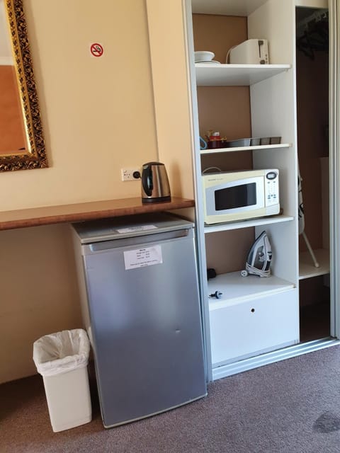 Fridge, microwave, coffee/tea maker, electric kettle