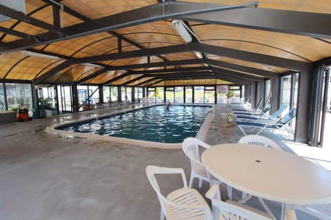 Indoor pool, seasonal outdoor pool, pool umbrellas, sun loungers