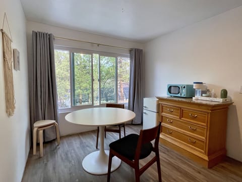 Standard Studio Suite | Private kitchen | Mini-fridge, microwave, coffee/tea maker, eco-friendly cleaning products