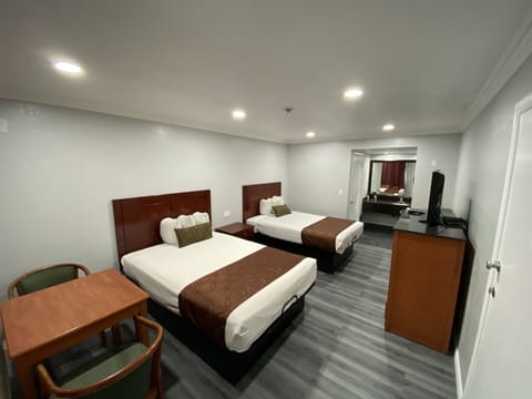 Standard Room, Multiple Beds | Desk, iron/ironing board, free WiFi, bed sheets