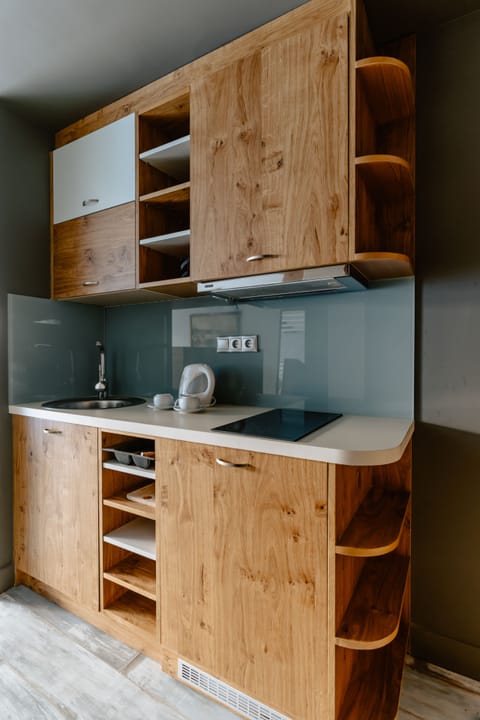 Superior Studio, Garden View | Private kitchen | Fridge