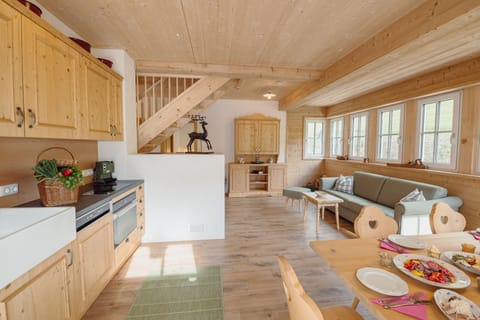 Deluxe Chalet | Private kitchen | Full-size fridge, oven, dishwasher, espresso maker