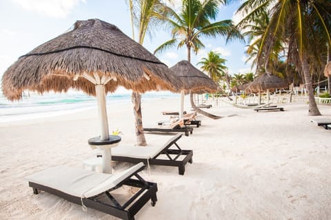 Beach nearby, sun loungers, beach umbrellas