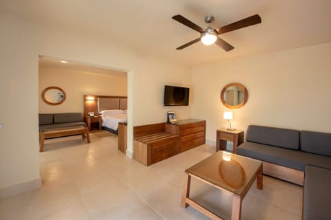 Family Junior Suite | Down comforters, free minibar, in-room safe, individually decorated