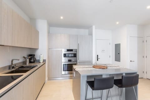 Condo, 2 Bedrooms | Private kitchen | Fridge, oven, coffee/tea maker
