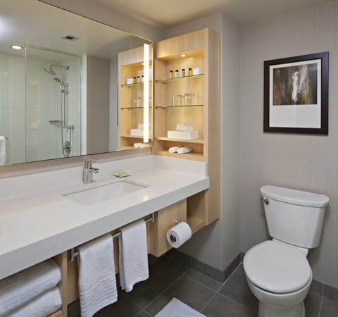 Combined shower/tub, designer toiletries, hair dryer, heated floors