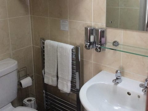 Shower, free toiletries, hair dryer, towels