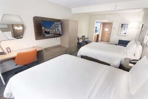 Suite, 2 Queen Beds | In-room safe, desk, iron/ironing board, free cribs/infant beds