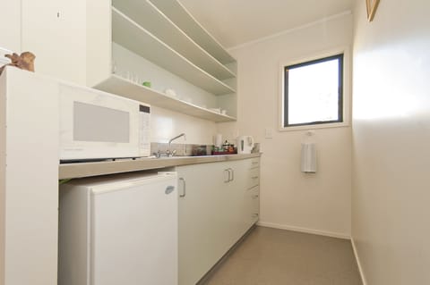 Beachside Unit (No Sea View) | Private kitchen | Full-size fridge, microwave, stovetop, coffee/tea maker