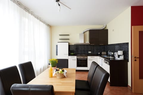 Apartment (4 Persons) | Living area | Flat-screen TV