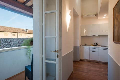 Suite, Balcony | Private kitchen | Full-size fridge, microwave, stovetop, espresso maker