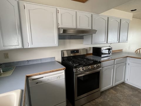 Family Room, 3 Bedrooms, Kitchen (First Floor) | Private kitchen | Microwave, coffee/tea maker