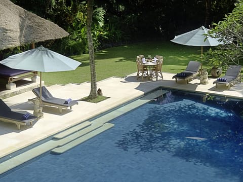 Outdoor pool, pool umbrellas, sun loungers