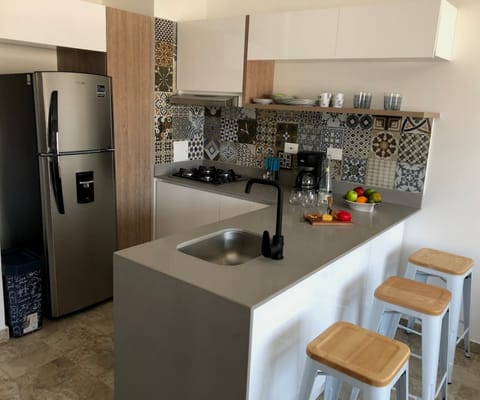 Apartment | Private kitchen | Fridge, cookware/dishes/utensils