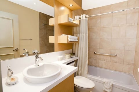 Standard Room, 2 Queen Beds | Bathroom | Combined shower/tub, deep soaking tub, eco-friendly toiletries