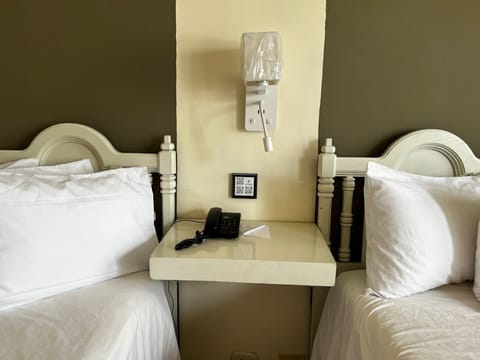 Deluxe Double Room, 2 Queen Beds | Desk, laptop workspace, free WiFi, bed sheets