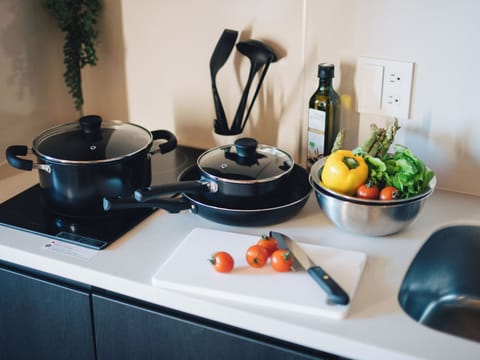 Full-size fridge, microwave, stovetop, griddle