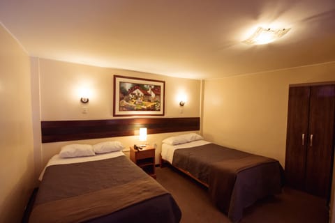 Twin Room | Desk, blackout drapes, free WiFi, bed sheets