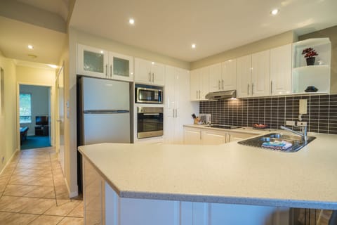 Apartment, 2 Bedrooms | Private kitchen | Full-size fridge, microwave, oven, stovetop