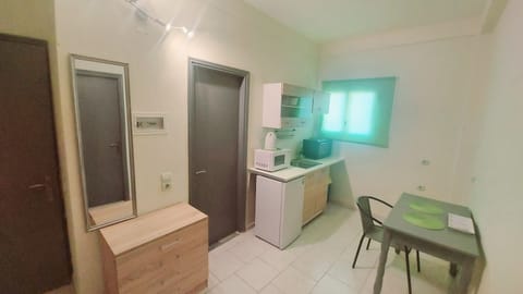 Mini-fridge, microwave, cookware/dishes/utensils