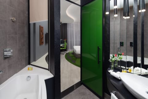 Sky Deluxe Room | Bathroom | Hair dryer, bathrobes, slippers, bidet