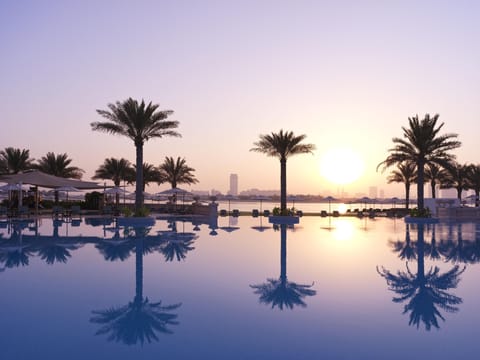 Indoor pool, outdoor pool, open 7:00 AM to 6:00 PM, pool umbrellas