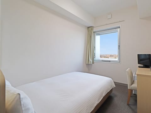 Standard Semi Double Room, Non Smoking | Down comforters, laptop workspace, blackout drapes, iron/ironing board