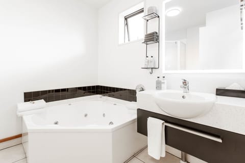 Family Apartment | Bathroom | Designer toiletries, hair dryer, towels