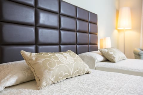 Classic Double Room, Balcony, City View | Down comforters, in-room safe, desk, blackout drapes