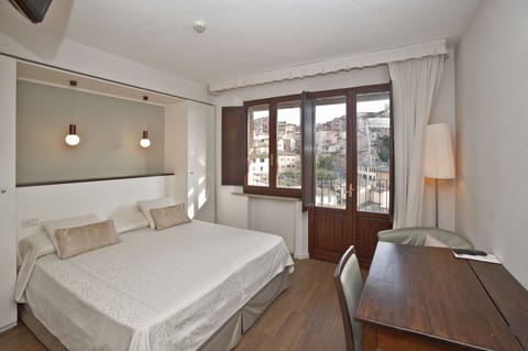 Superior Double Room, Balcony, City View | Down comforters, in-room safe, desk, blackout drapes