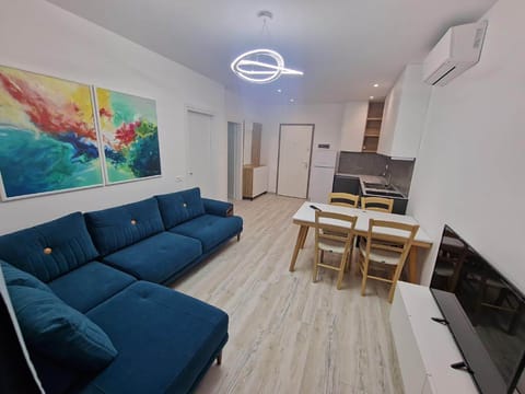 Apartment, Sea View | Living room | 32-inch flat-screen TV with cable channels, TV