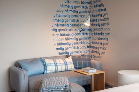 Hypo-allergenic bedding, minibar, in-room safe, desk