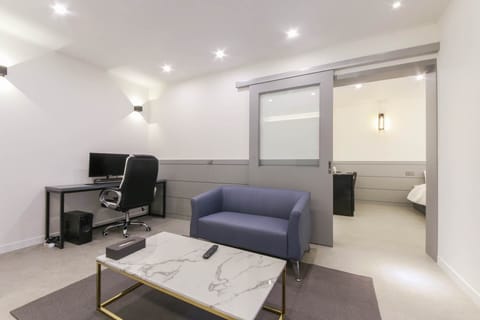 Junior suite with styler,air purifier,1PC | Living area | 49-inch flat-screen TV with cable channels, TV