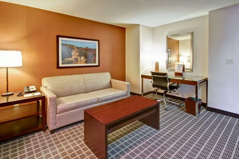 Junior Suite, 1 King Bed | Living area | 37-inch LCD TV with satellite channels, Smart TV, MP3 dock