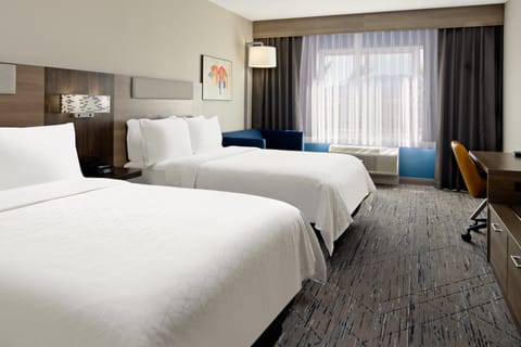 Suite, 2 Queen Beds | In-room safe, desk, laptop workspace, blackout drapes