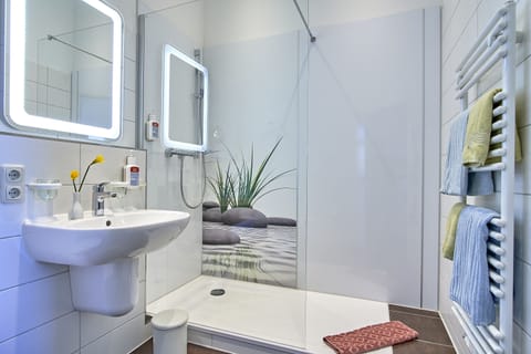 Shower, eco-friendly toiletries, hair dryer, heated floors