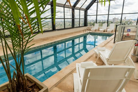 Indoor pool, open 6:00 AM to 10:00 PM, sun loungers