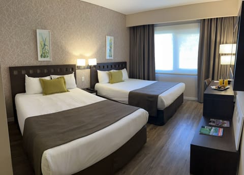 Deluxe Room, 2 Double Beds | Minibar, in-room safe, desk, iron/ironing board