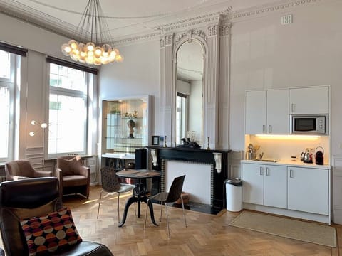 Superior Apartment, 1 King Bed | Living area | Flat-screen TV